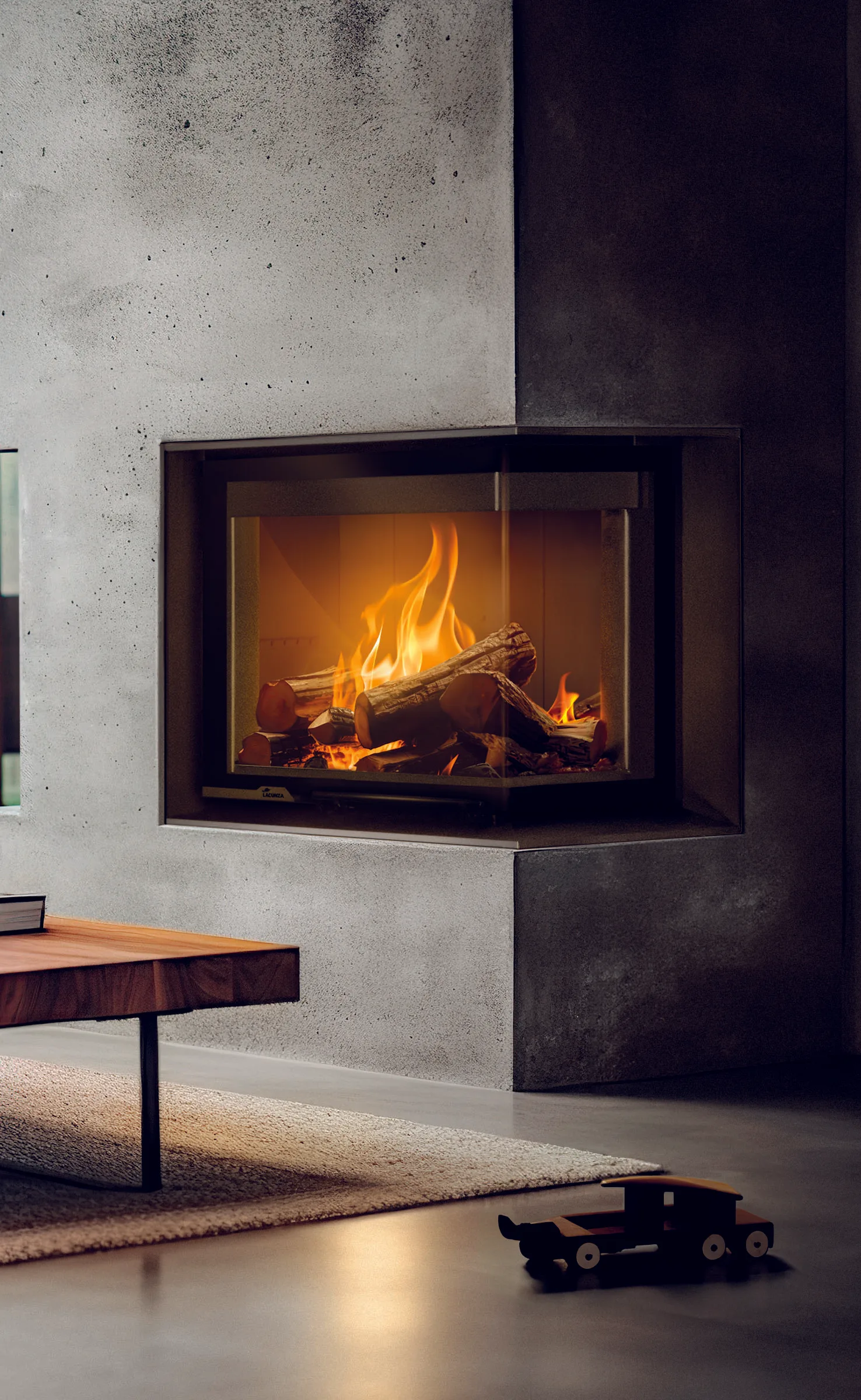 Grey corner sofa by glass fireplace. Minimalist home interior design of modern living room.